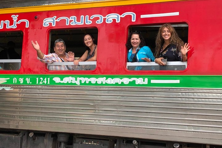 Maeklong Railway Market stalls on the tracks