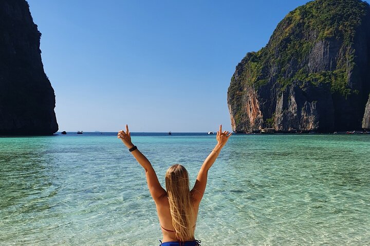 Limestone cliffs and turquoise water on a Phuket island day trip